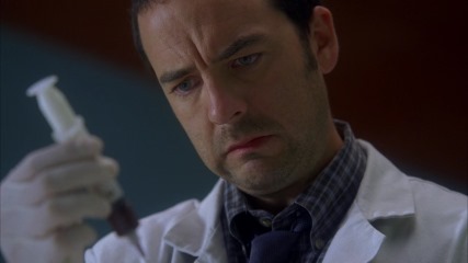 Dr. Travis "Grumpy" Brennan